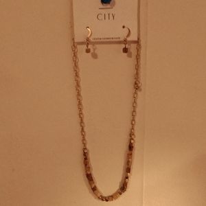 City matching earrings and necklace